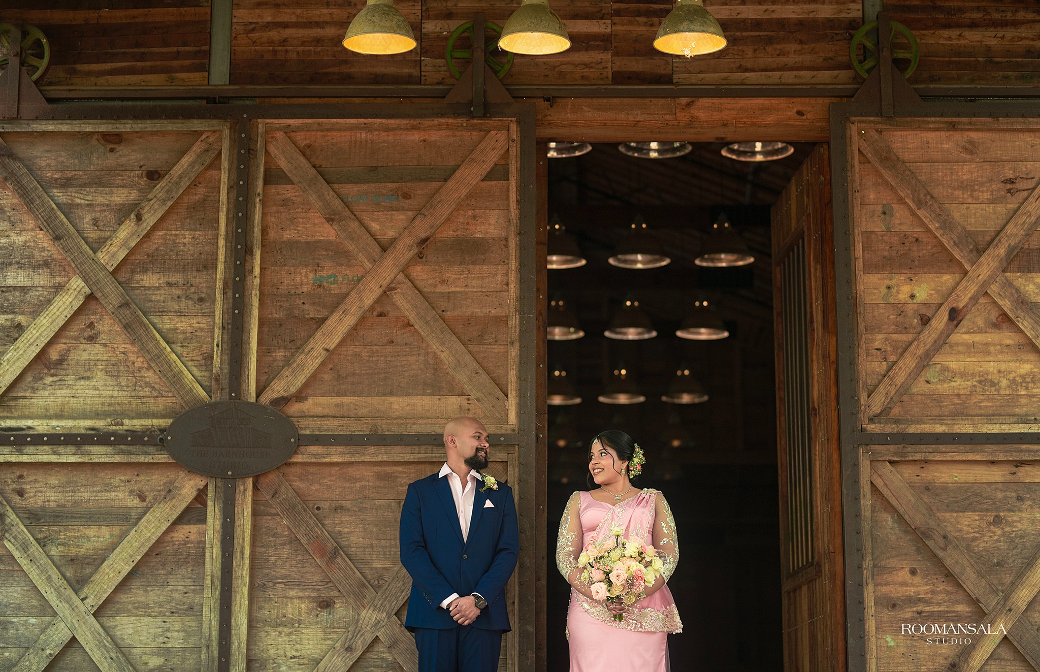 Terani and Eshan at the barn doors